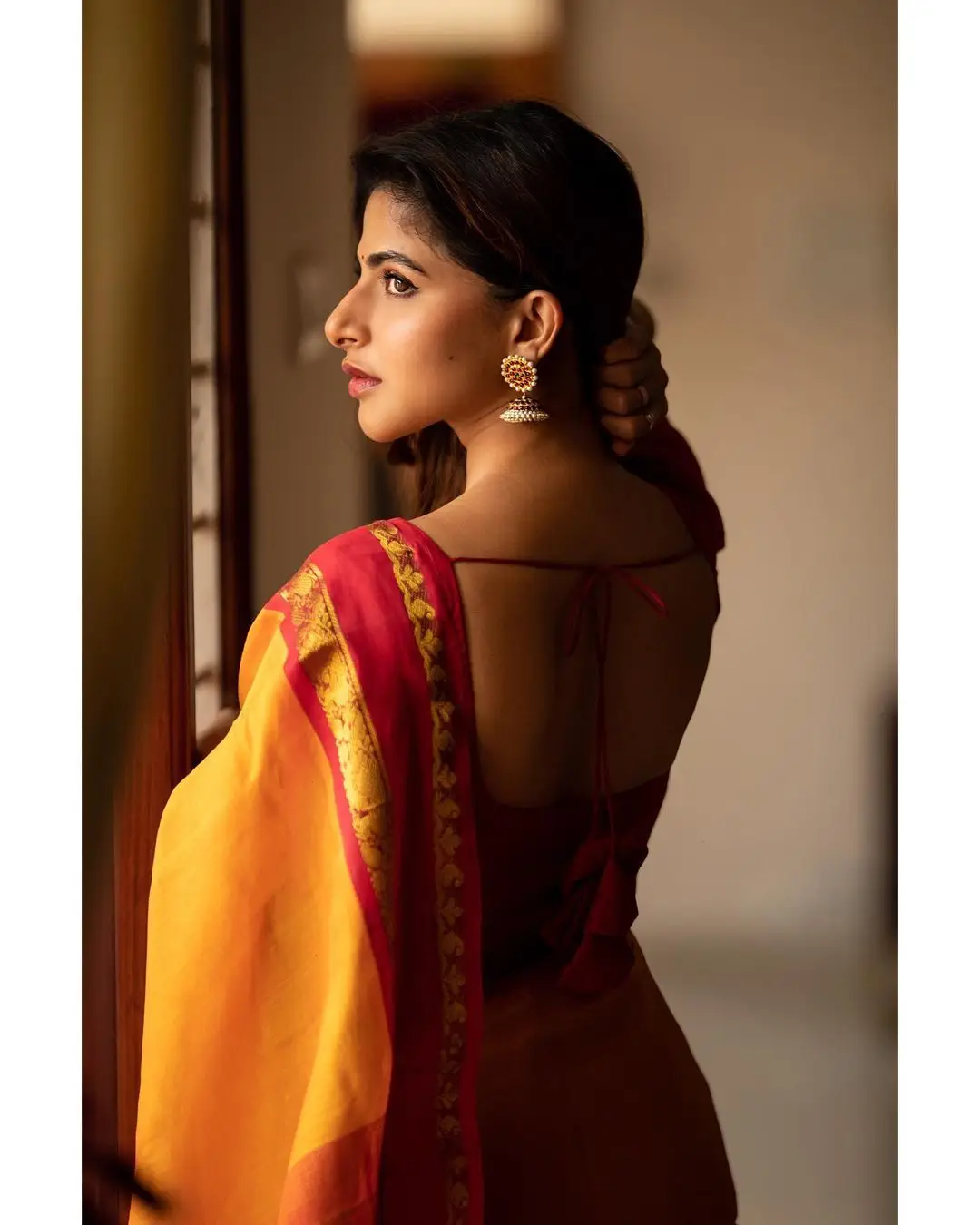 Indian Girl Iswarya Menon In Traditional Orange Saree Sleeveless Blouse